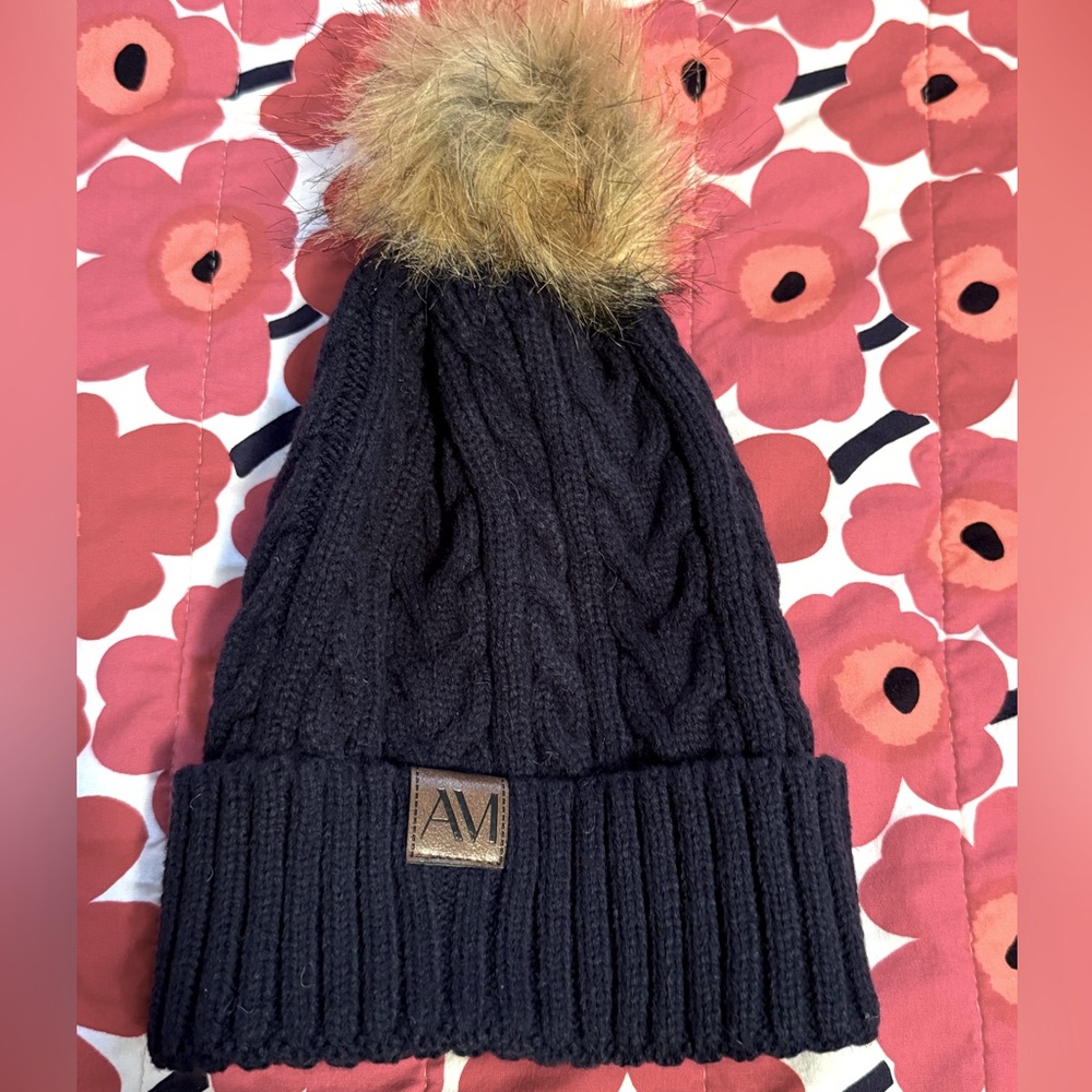 Cable knit hat with faux Pom Pom